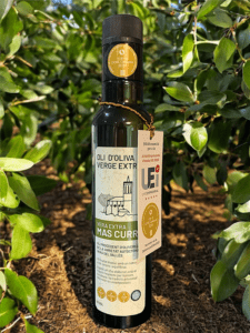 Mostra de les ampolles d'oli d'oliva verge Vera Extra repartides durant l'esdeveniment